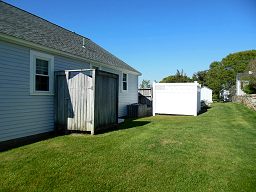 Backyard with outside shower<br> and enclosed patio